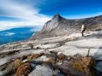 Woman hinking down Kinabalu mountain in Kinabalu national park. Kota kinabalu - Malasia.; 