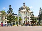 MAPUTO, MOZAMBIQUE - APRIL 29: Main railway statiion and bus terminal of Maputo, Mozambique on April 29, 2012. The station is transport hub for the country and historical landmark of colonial period; 