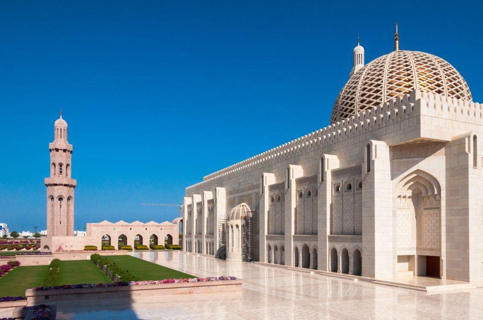 View of courtyard and minaret from the gardens of the mosque.