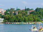 People sail on catamarans at Xuan Huong Lake. This artificial lake in the city centre is a favourite place for tourists and locals for walking.