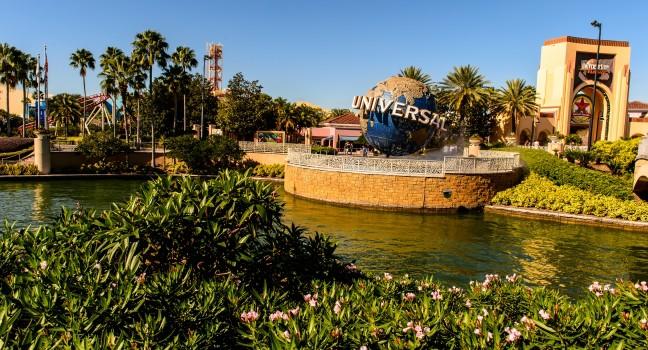 ORLANDO, USA - DECEMBER 19, 2013: Universal Logo in front of Universal Studios Orlando. Universal Studios Orlando is a theme park resort in Orlando, Florida.; 
