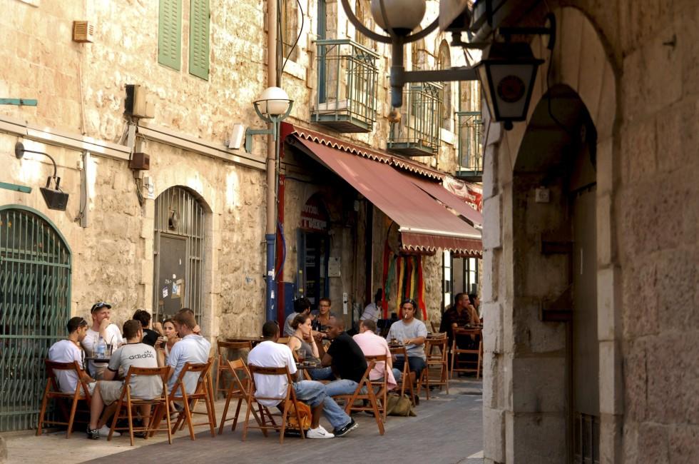 JERUSALEM - AUG 17:Young Israeli people in a cafe in Nahalat Shiva on Oct 17 2007.Jerusalem has been the holiest city in Jewish tradition since King David of Israel first established in 1000 BCE.