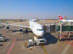 JOHANNESBURG - APRIL 18:Airbus A340 disembarking passengers after intercontinental flights on April 18, 2012 in Johannesburg, South Africa. Johannesburg Tambo airport is the busiest airport in Africa