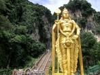 Climbing Hindu pilgrimage to Batu Caves, near Kuala Lampur, Gombak, Southeast Asia, Malaysia