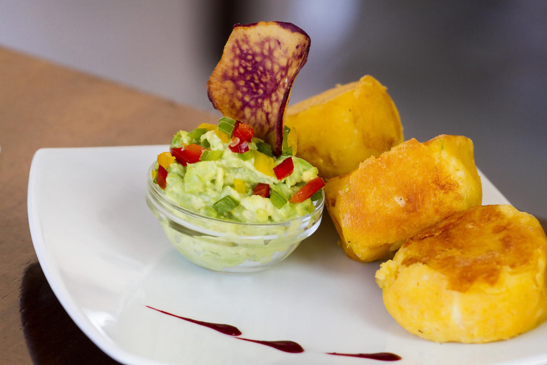 Quito-Cheesy-Dishes-Llapingachos-Achiote1
