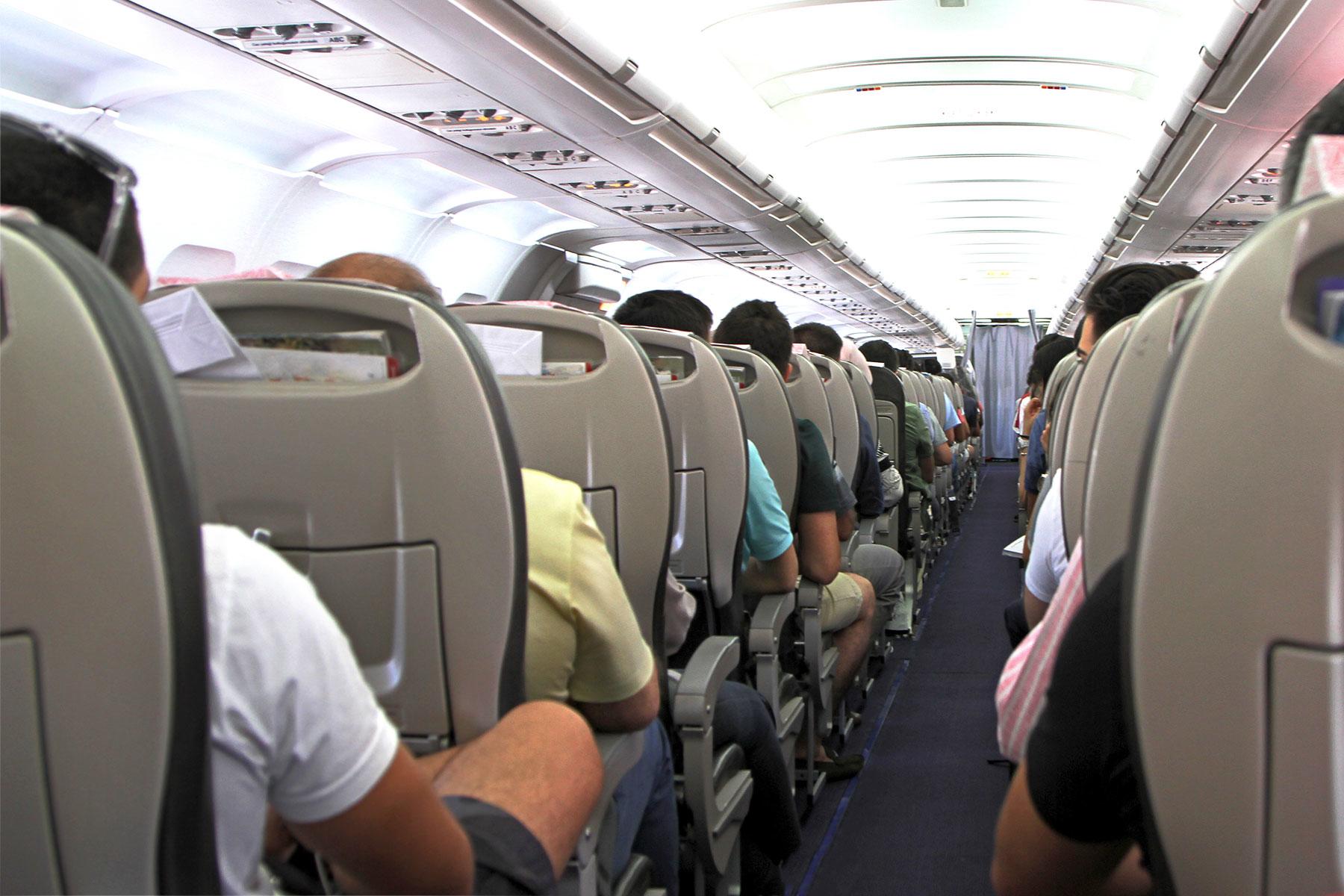 What Seat to Pick in Economy If You're Tall