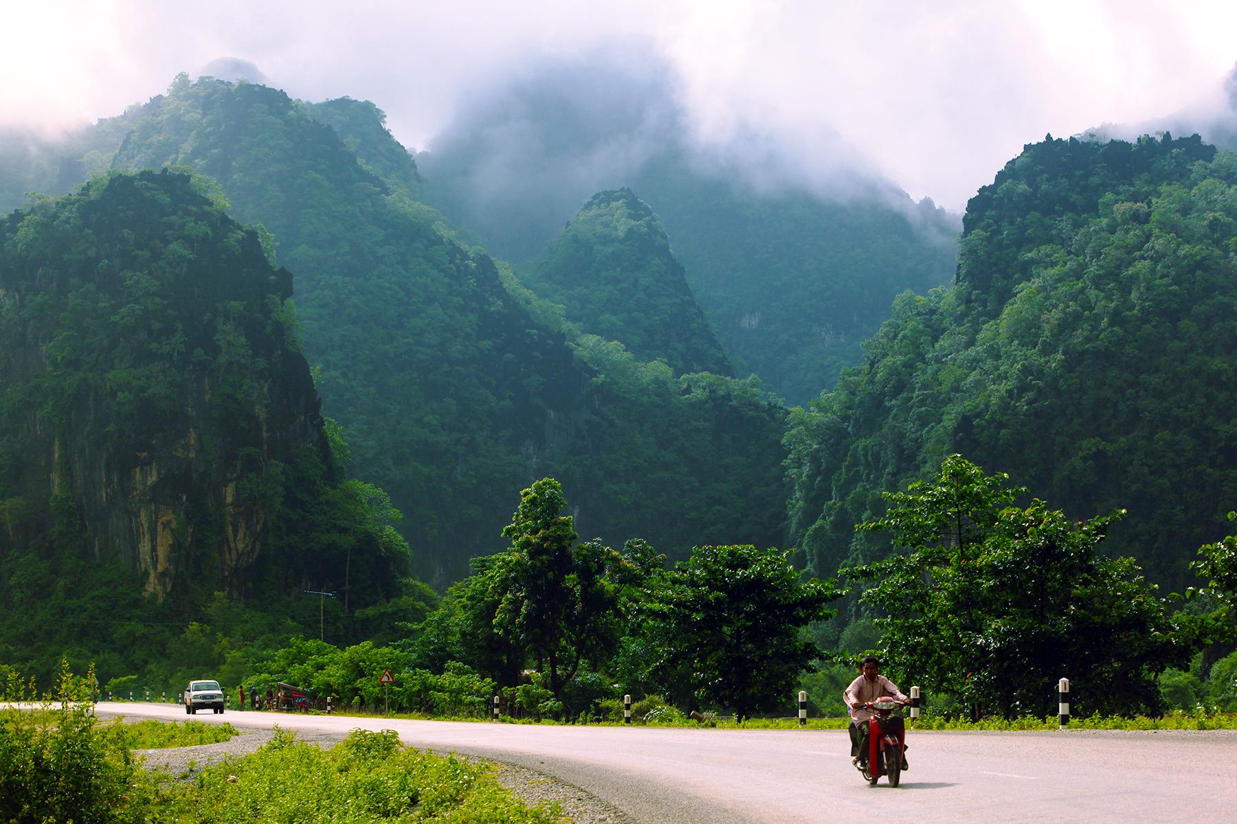 05_10ThingstoKnowbeforegoingtoLaos__MotorbikinginLaos_shutterstock_1035422773