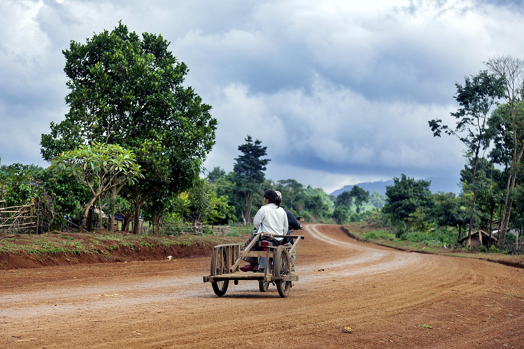 09_25UltimateThingstodoinLaos__MotorbiketheThakekloop_dreamstime_l_30907212