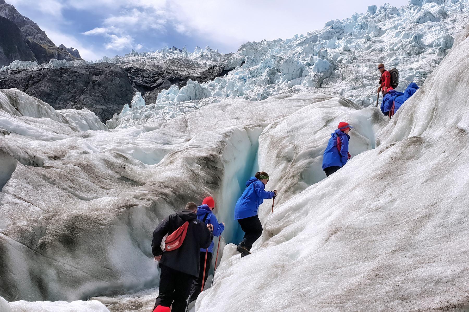 11_UltimateThingsToDoNewZealand__HikeFranzJosefGlacier_shutterstock_1282034089