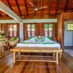 07_03_HotelAwards2020__Caribbean_JungleBayEcoVillas_7 4 Villa and Hand-painted Batik Bedding
