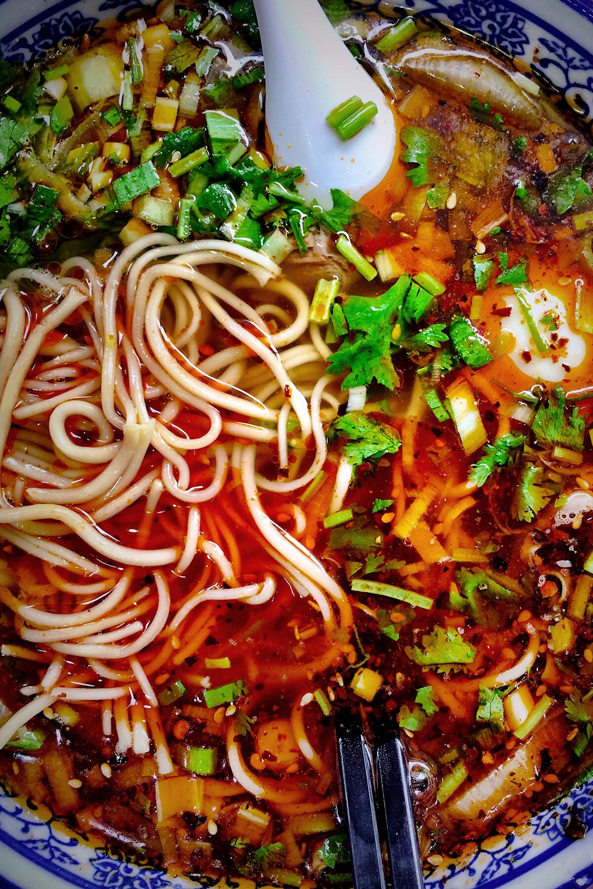 03_NoodlesToTryInChina__HandPulledNoodlesLaMian_shutterstock_1030772002