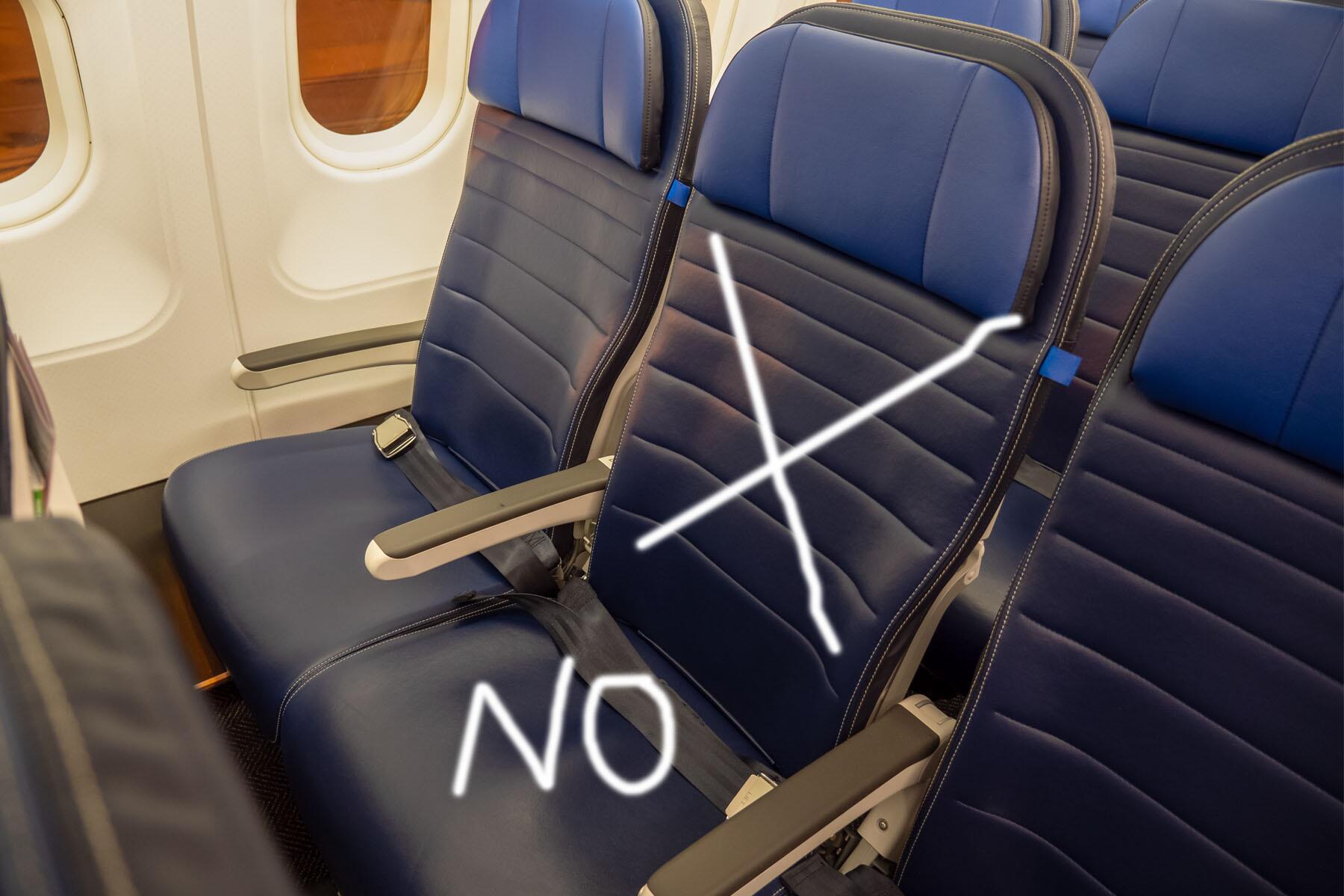What Would Actually Make the Middle Seat on a Plane Better?