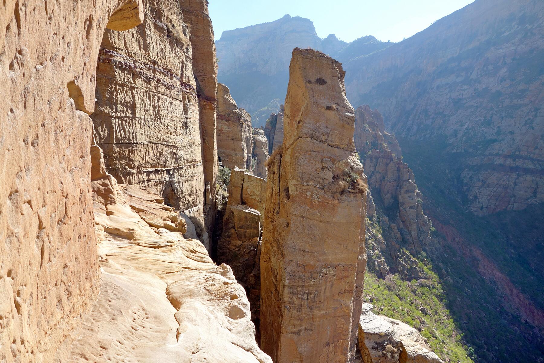 01_EthiopiaCliffChurches__AbuneYemataGuh_1.) Valley_view_of_Abuna_Yemata_Guh