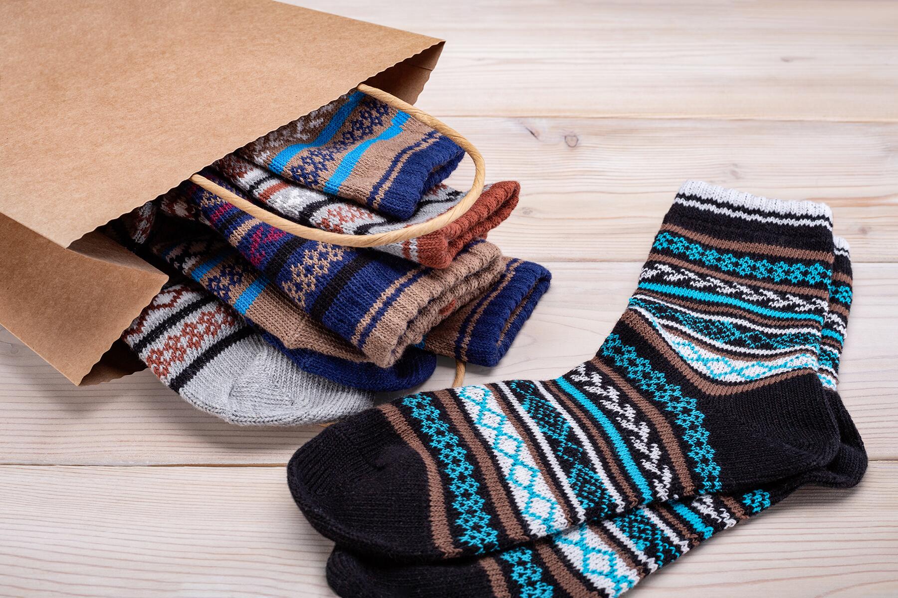 05_SafeTravelForHolidays__ExtraSocks_iStock-1272389377