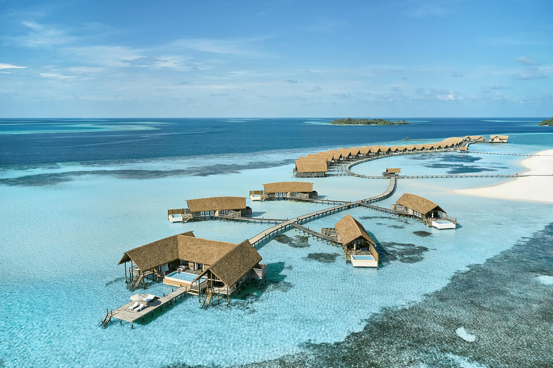 2-OverwaterBungalows-CocoaIsland-Aerial_COMO Water Villa and One Bedroom Water Villas