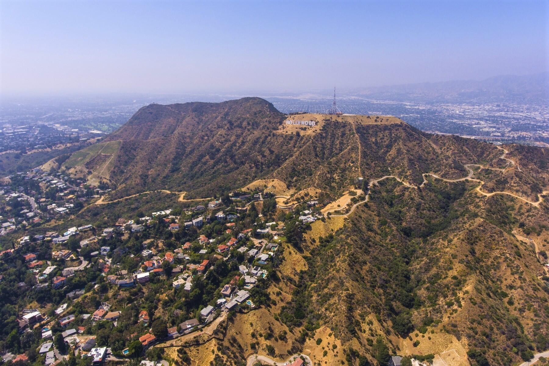<a href='https://www.fodors.com/world/north-america/usa/california/los-angeles/experiences/news/photos/10-best-places-to-see-the-hollywood-sign-in-los-angeles#'>From &quot;The 10 Best Places to View the Hollywood Sign: Helicopter Tours   &quot;</a>