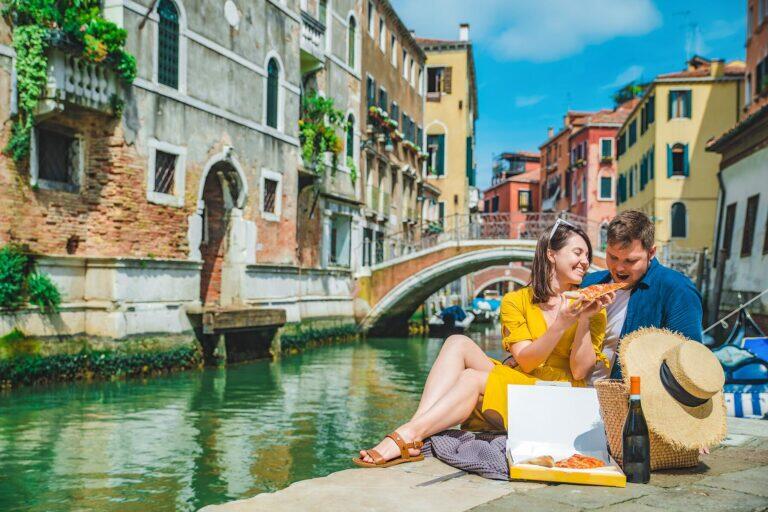 <a href='https://www.fodors.com/world/europe/italy/venice/experiences/news/photos/dont-do-these-things-in-venice-italy#'>From &quot;10 Things You Should NEVER Do if Visiting Venice: Don’t Use Bridges, Piazzas, and Other Public Spaces as Picnic Spots&quot;</a>
