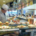 <a href='https://www.fodors.com/world/asia/japan/tokyo/experiences/news/photos/heres-how-to-save-money-when-you-visit-tokyo#'>From "Tokyo Is Expensive! So, Here Are 10 Ways to Save Money When You Visit: Choose Sushi Places Wisely"</a>