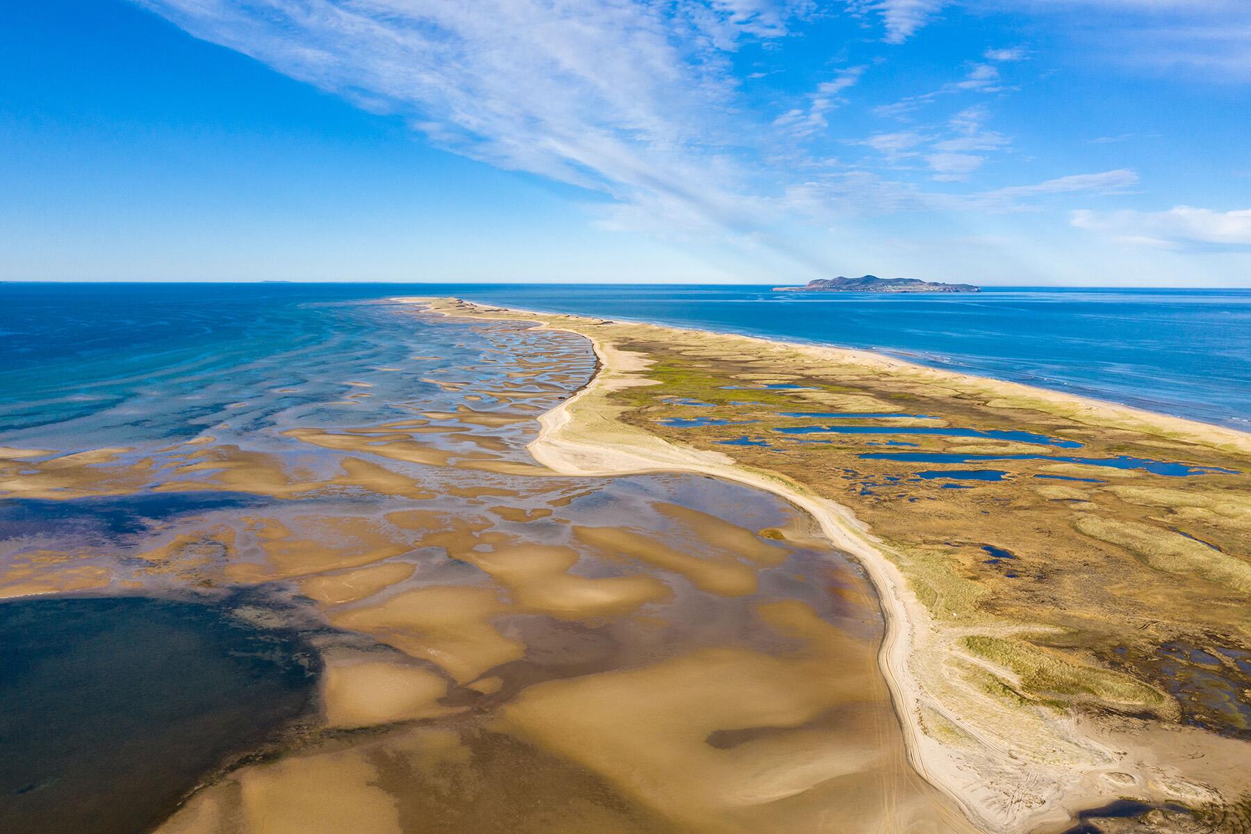 <a href='https://www.fodors.com/world/north-america/canada/experiences/news/photos/canadas-best-beaches-from-red-sand-shores-to-midnight-sun-swims#'>From "Yes, Canada Has Amazing Beaches. These Are the 11 Best: Du Havre Beach"</a>