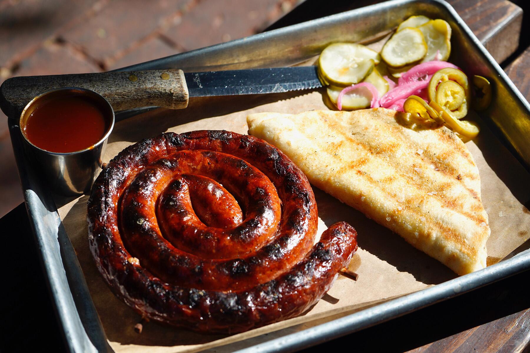 <a href='https://www.fodors.com/world/north-america/usa/texas/austin/experiences/news/photos/best-things-to-do-in-austin#'>From "The 15 Best Things to Do in Austin, Texas (And the Top Things to Avoid): Must-Try Restaurant: Bangers Sausage House & Beer Garden"</a>